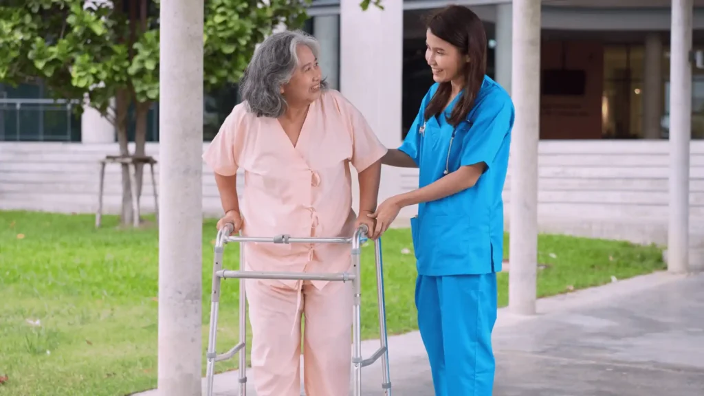 nurse helping elderly women