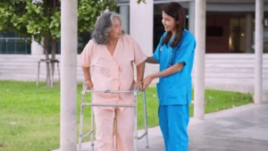 nurse helping elderly women