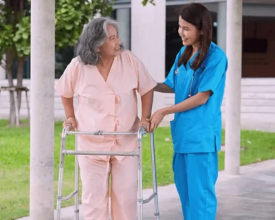 nurse helping elderly women