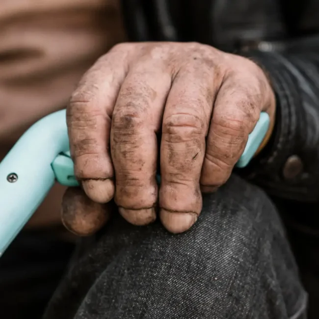 NRI child video calling elderly parents in India showing emotional connection and care across distance