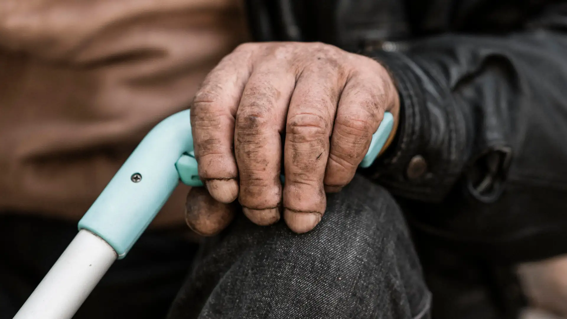 NRI child video calling elderly parents in India showing emotional connection and care across distance