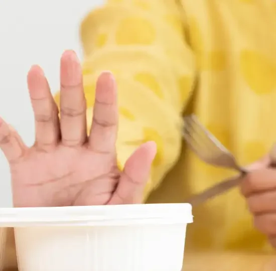 Elderly parent eating alone at home